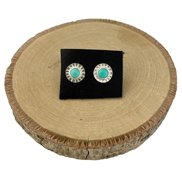 Turquoise cabochons. set in fine and sterling silver.