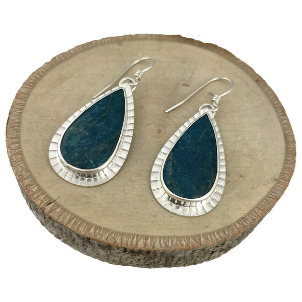 Earrings featuring apatite cabochons set in fine and sterling silver.