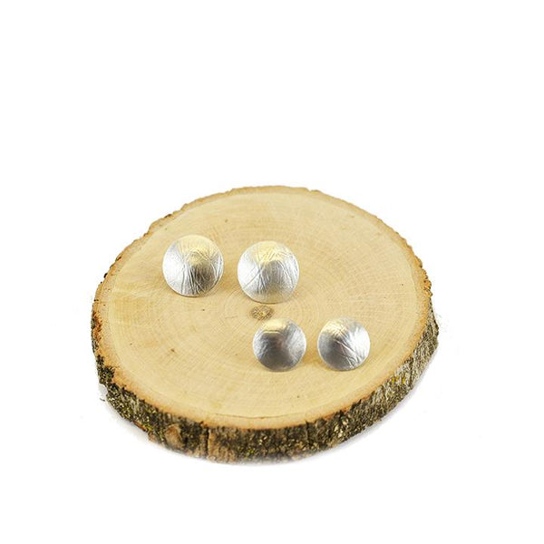 Sterling silver button style stud earring with organic texture