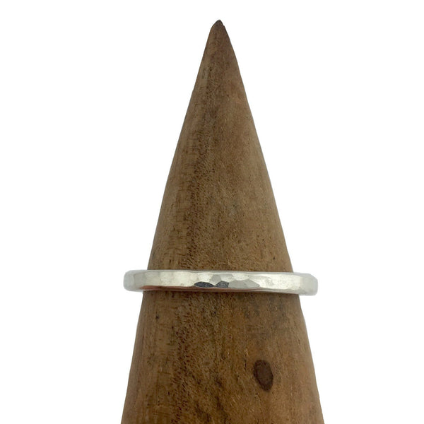 close up of hammered stacking ring
